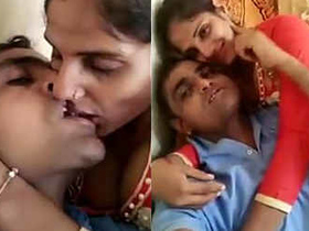 Two young men sharing a kiss with each other