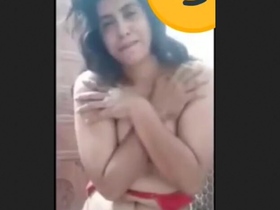 A stunning Indian woman indulges in self-pleasure while bathing