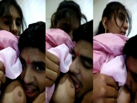 Indian couple enjoys tit sucking on camera
