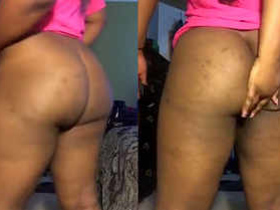 Mature black woman shows off her butt