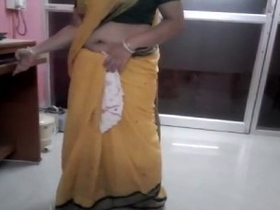 Tamil wife sex video featuring a seductive saree blouse