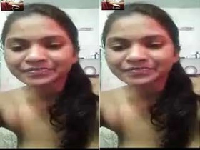 Exclusive video of cute girl showing off her boobs