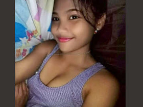 A cute Indian girl with big tits showcases her assets in a video call