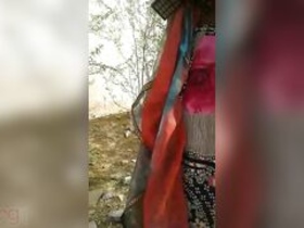 Village girl with big tits and hairy pussy gets naughty in the outdoors