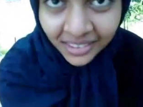 A cute girl from the webcam shows off her skills in the great outdoors