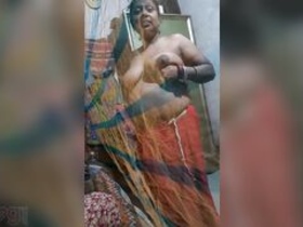 Desi wife caught on camera with big boobs on display
