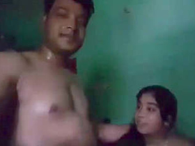 A mischievous South Asian couple engages in intimate activities in their rural community
