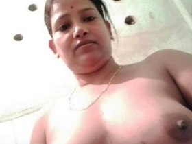 Indian woman using her fingers for pleasure