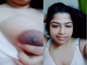 Amateur Indian babe flaunts her big tits and big ass in exclusive video