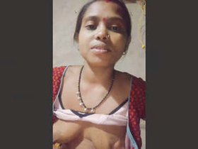 Indian village bhabhi fondles her boobs in solo video