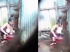 South Asian woman takes a bath