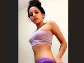 Young Latina teen exposes her sweet body in a steamy video