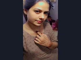 VK flaunts her voluptuous assets in front of her boyfriend