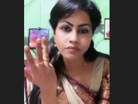 Indian wife undresses for a sensual bath