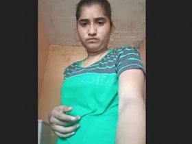 A stunning girl recording a video