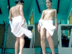 Young and seductive girl strips for her boyfriend