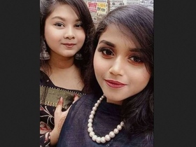 Watch a busty Indian girl show off her curves