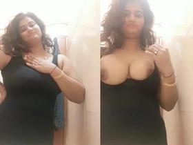 Busty Indian babe flaunts her breasts in a solo video