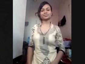 Aroused girl reveals her breasts