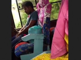 Passenger records a guy masturbating on the bus, knowing that he's being watched