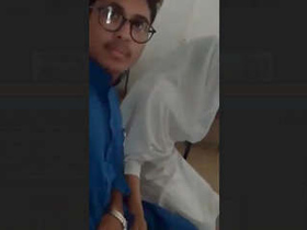 Pakistani girlfriend performs a handjob on her boyfriend in a classroom