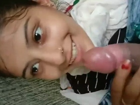 Cute girl gives a blowjob while filming herself