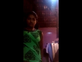 Exclusive video of a cute Tamil schoolgirl showing off her boobs