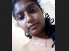Indian woman reveals her breasts and vagina