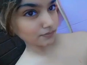 Beautiful Indian girl enjoying a bath in the shower