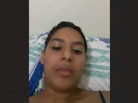 A young woman from Sri Lanka pleasures herself with her fingers