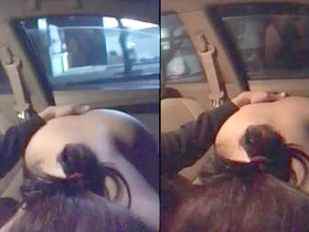 An audacious Indian wife strips naked and performs oral sex on her husband while riding in a car