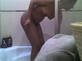 A Tamil girlfriend's shower scene captured on camera