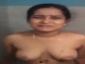 Telugu bhabhi's nude bath and clothing