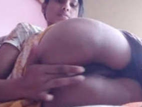 Young Indian girl fingers herself in front of the camera