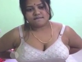 Busty Indian lady flaunts her body in a solo video