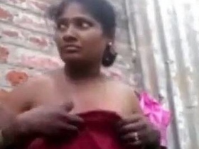 A local girl shows off in a solo video in a bathroom