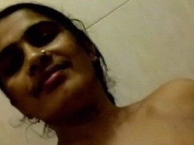Mature Indian woman indulges in nude selfies in the bathroom