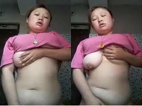 Exclusive video of a horny Assam girl flaunting her big boobs and pussy