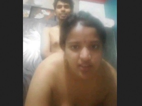 A stunning wife engages in doggy style sex while speaking obscenely in Hindi