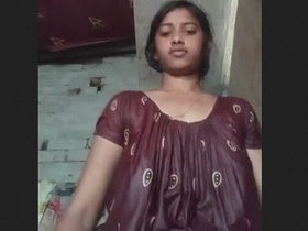 Nepali college girl flaunts her big tits in a steamy video