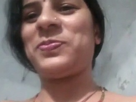 Indian auntie indulges in solo play with self-fingering and nude selfies