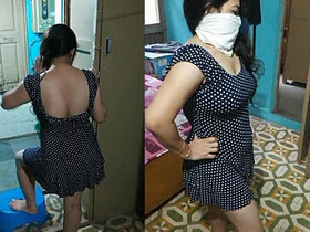 Hot Indian auntie's seductive poses in revealing dress