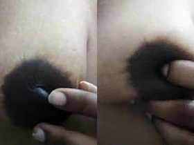 A girl from Andhra Pradesh displays her areola