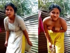 Stunning Bangladeshi woman takes a relaxing bath in the village