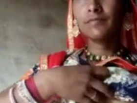 Indian wife flashes for boyfriend in front of son in video