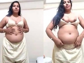 Mallu bhabi flaunts her big ass and curves in a steamy video