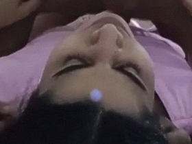 Home video of couple having sex in bed