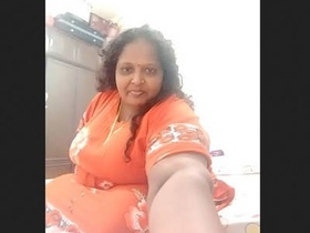 Desi fatty aunty flaunts her big boobs and pussy