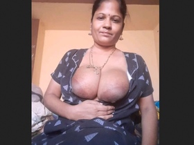 MILF with big boobs gives a hard blowjob in MMC video