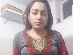 Watch this stunning Indian bhabhi strip and get naked on camera